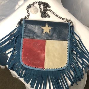P&G Texas flag genuine leather red, cream, and blue crossbody with fringes.